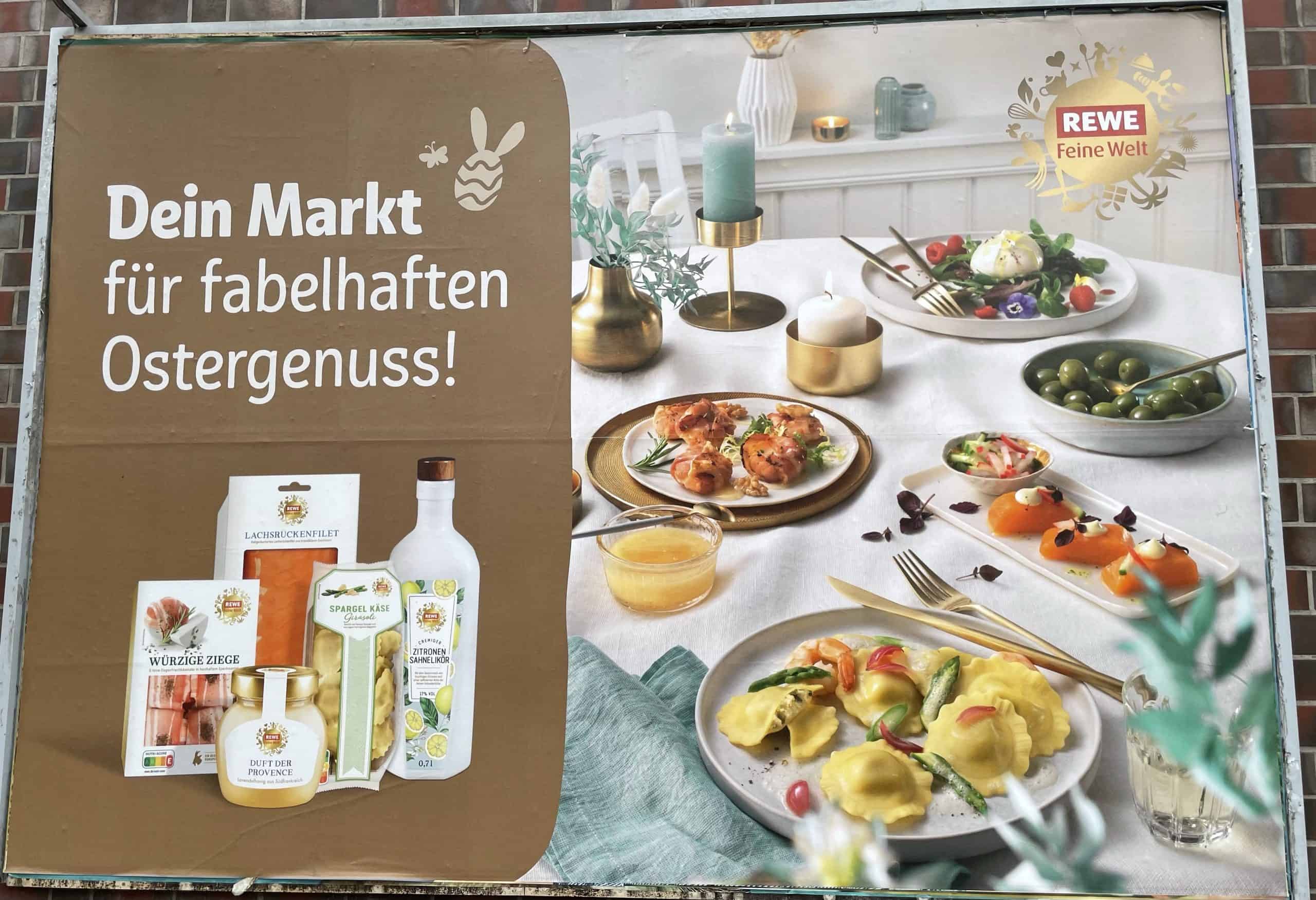 Rewe-Plakat mit Osterfenußlebensmitteln