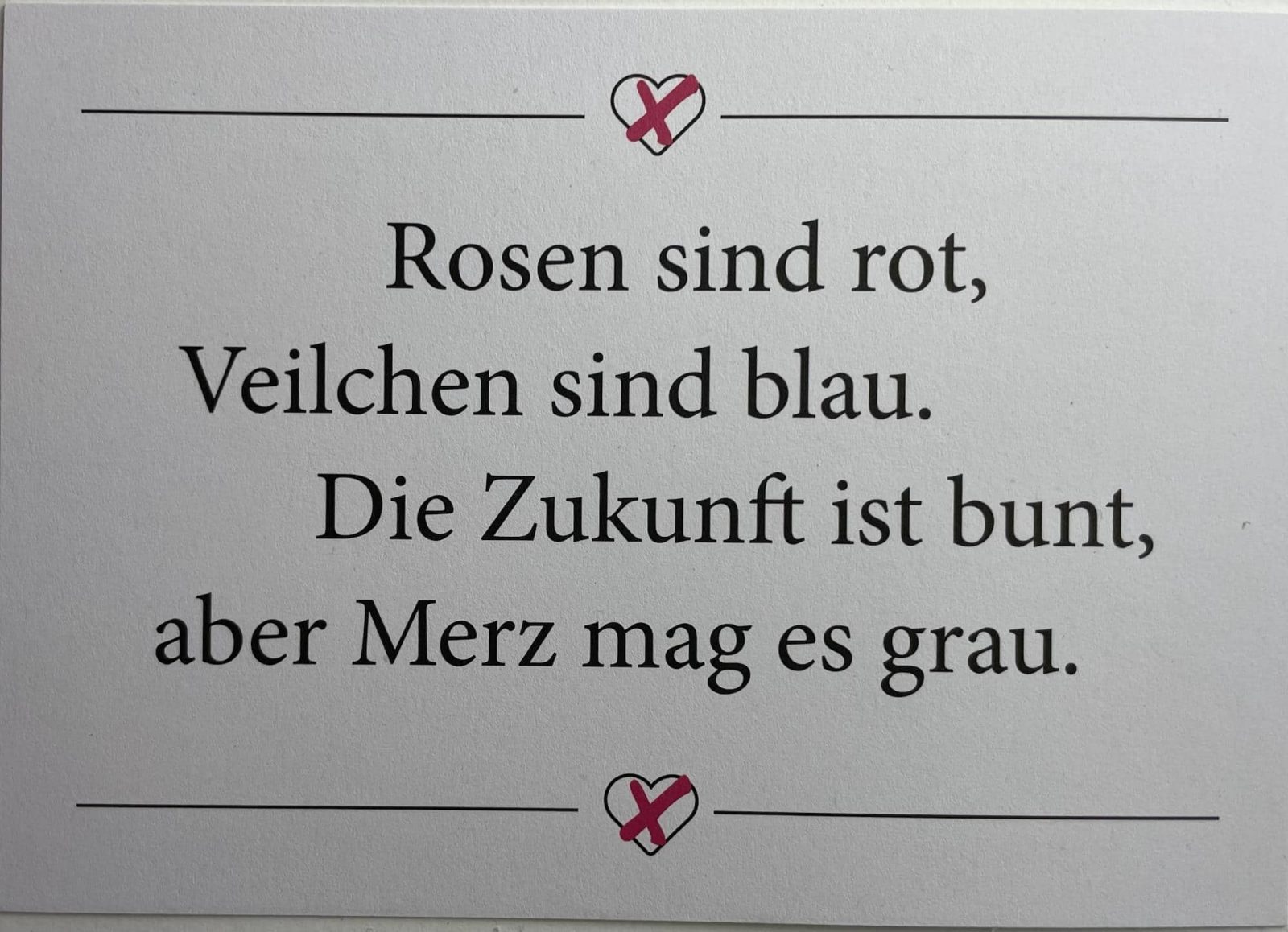 campat-Protestkarte: Rosen sind rot, Veilchen sind blau. Die Zukunft ist bunt, aber Merz mag es grau.