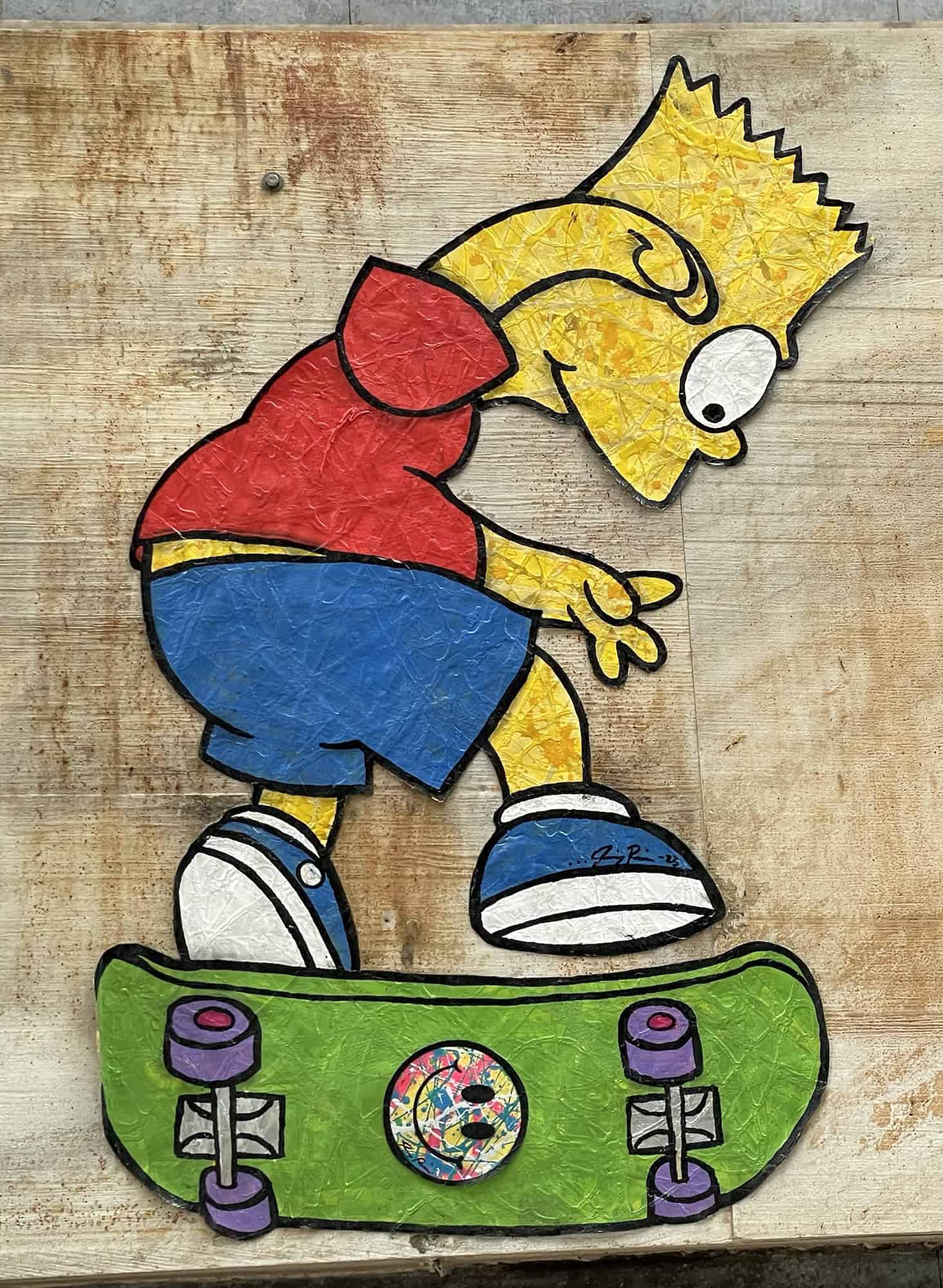 Wandbild mit Bart Simpson auf dem Skateboard.